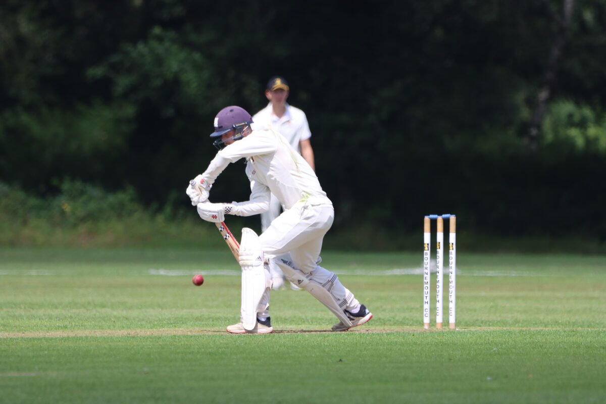 Junior batsman playing a shot