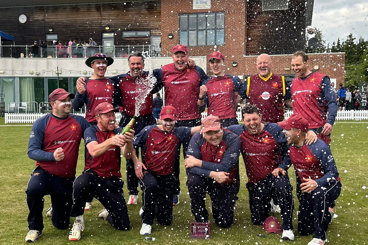 Team celebrating with champagne